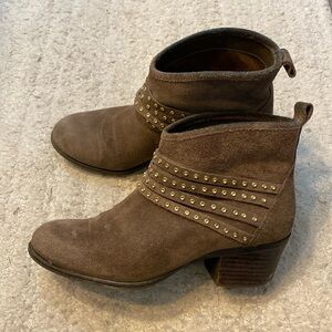 Gold studded booties.